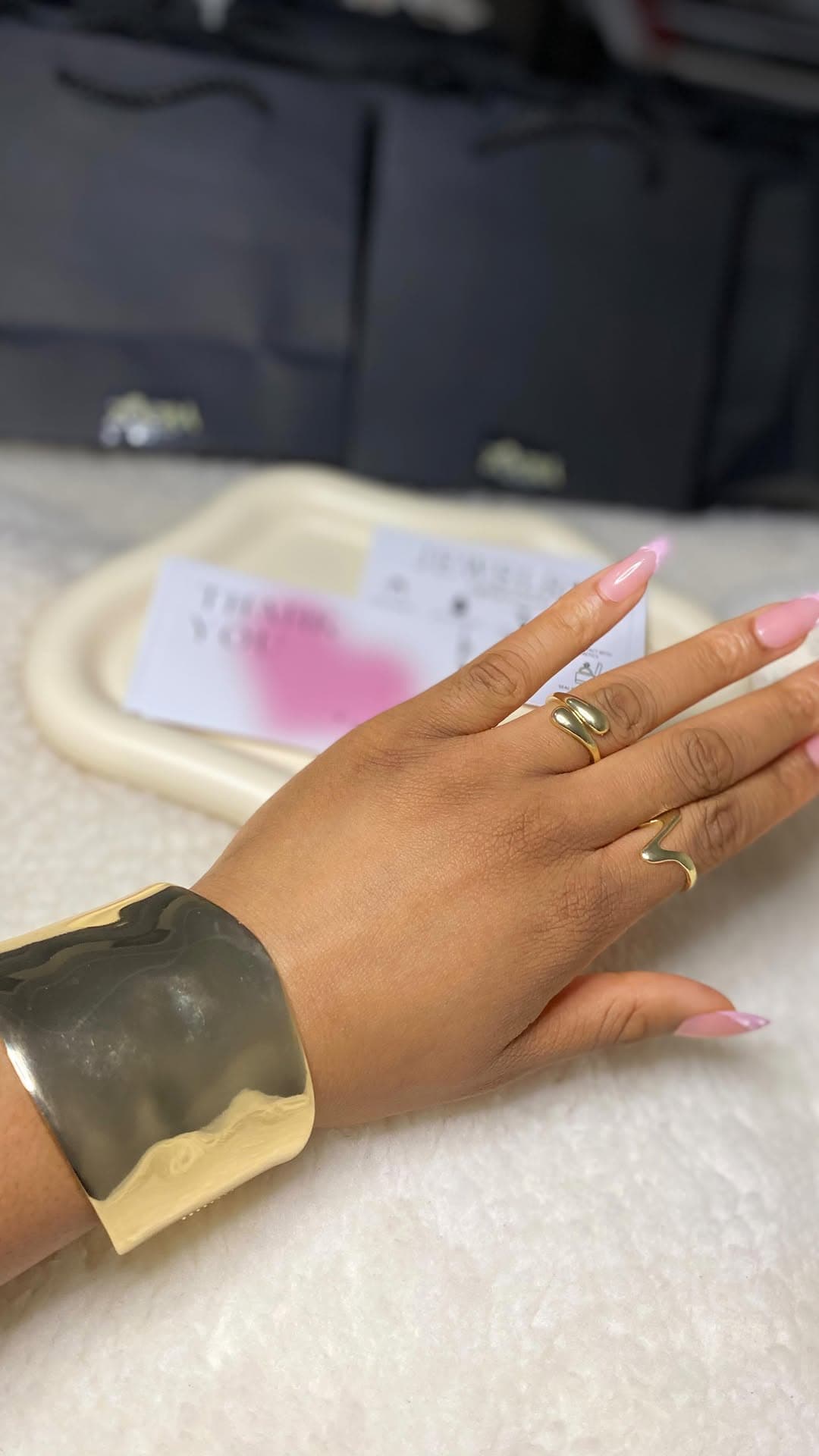 Model wearing Zoera gold necklace